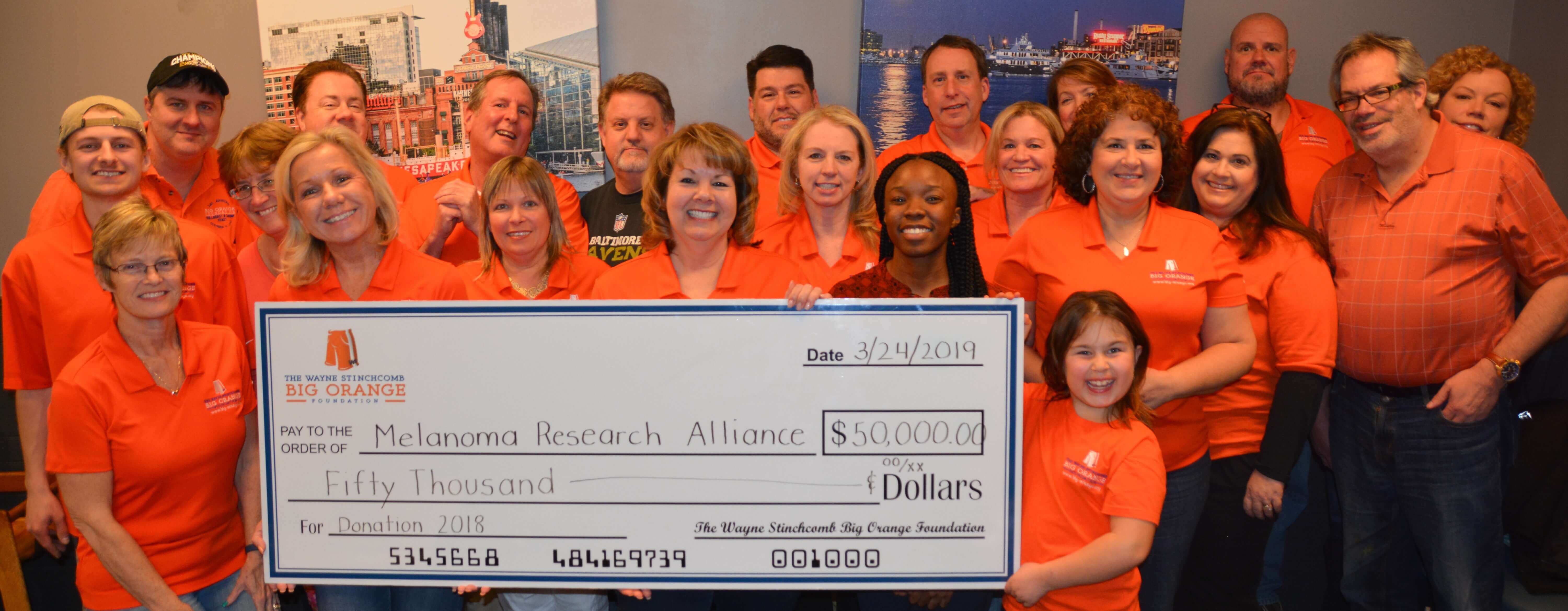 Big Orange Raises Money For Melanoma Research Alliance